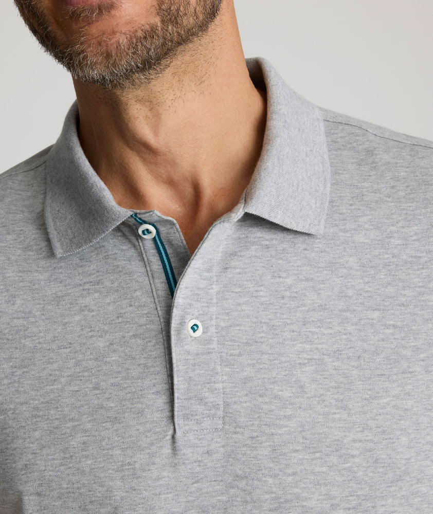 Model is wearing UNUCKIt damaschino in gray.