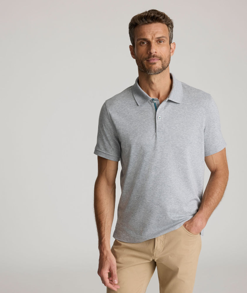 Model is wearing UNUCKIt damaschino in gray.