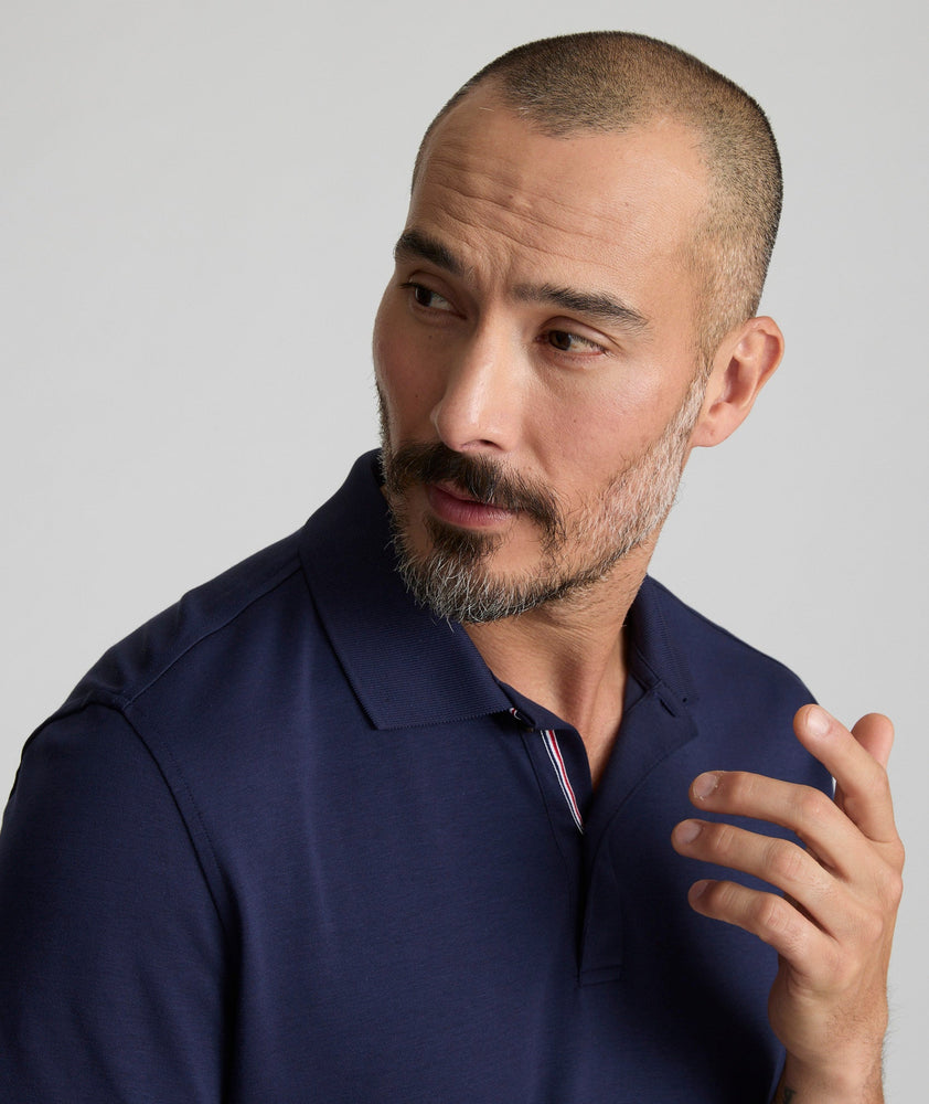 Model is wearing UNUCKIt damaschino in blue.