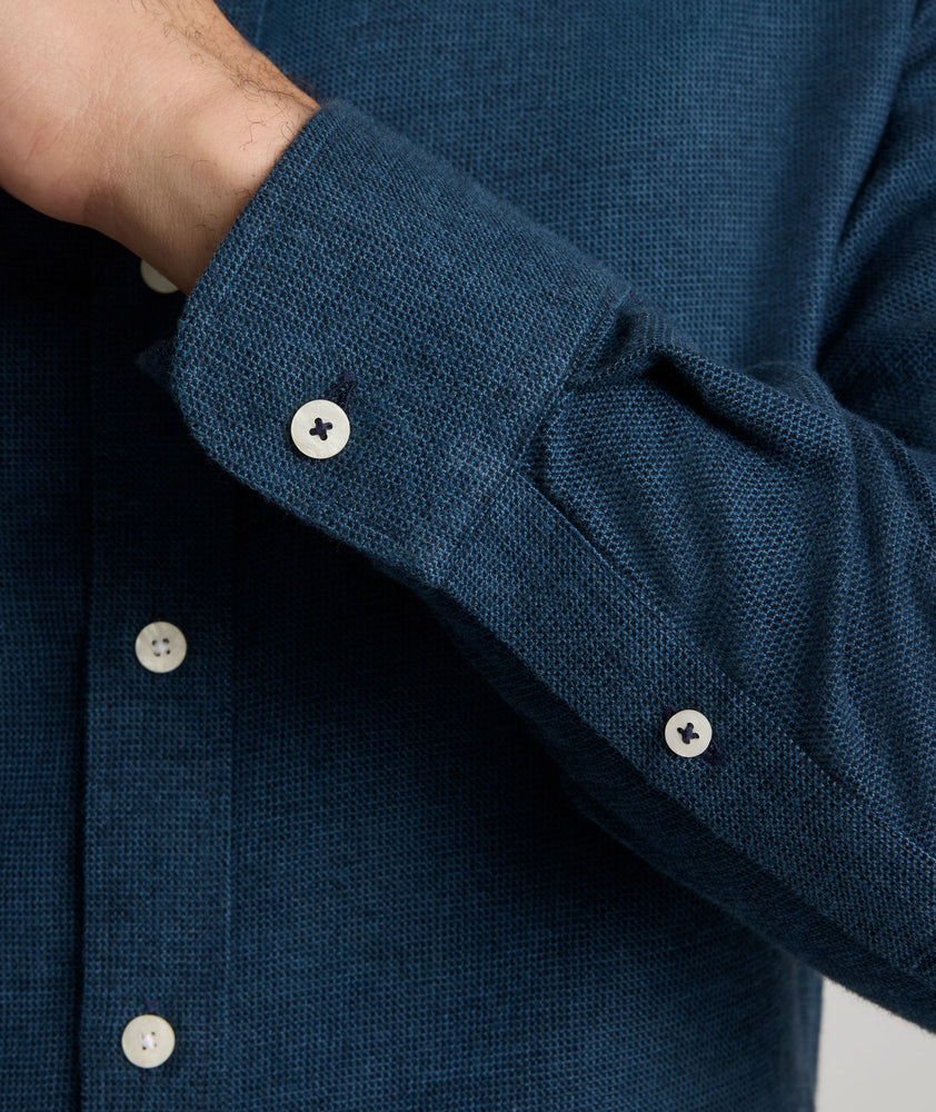 Model is wearing UNTUCKit Veneto shirt in teal.