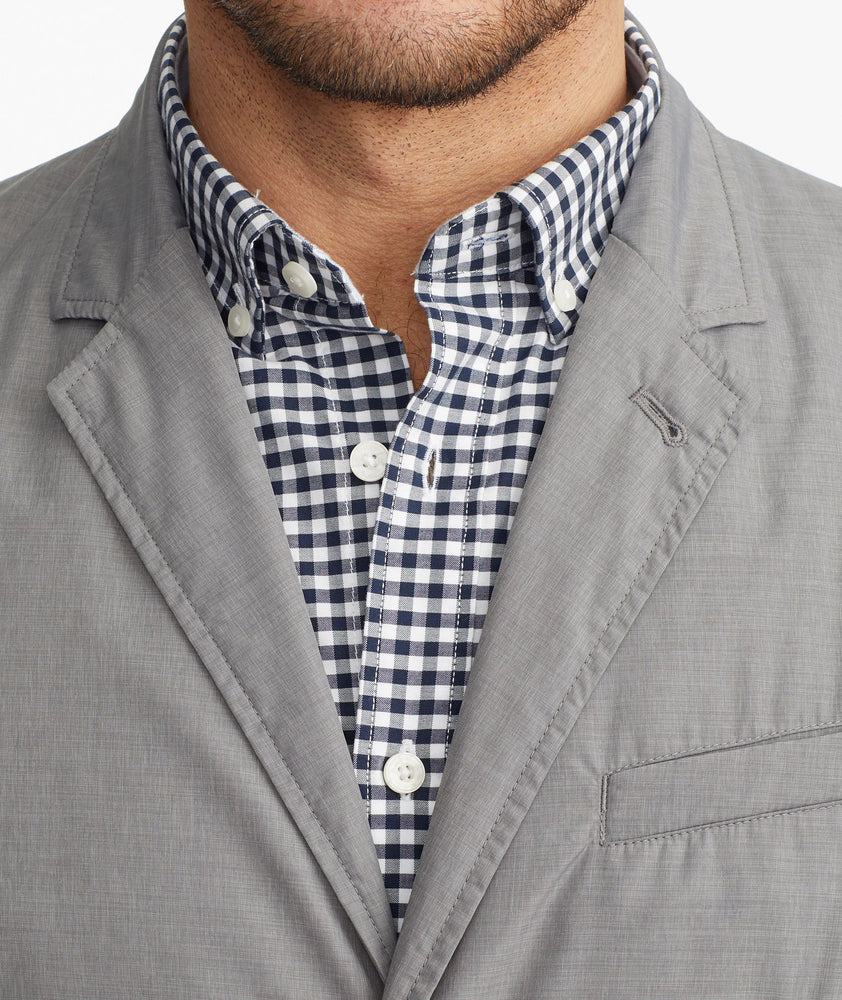 Model wearing a Light Grey The Travel Blazer