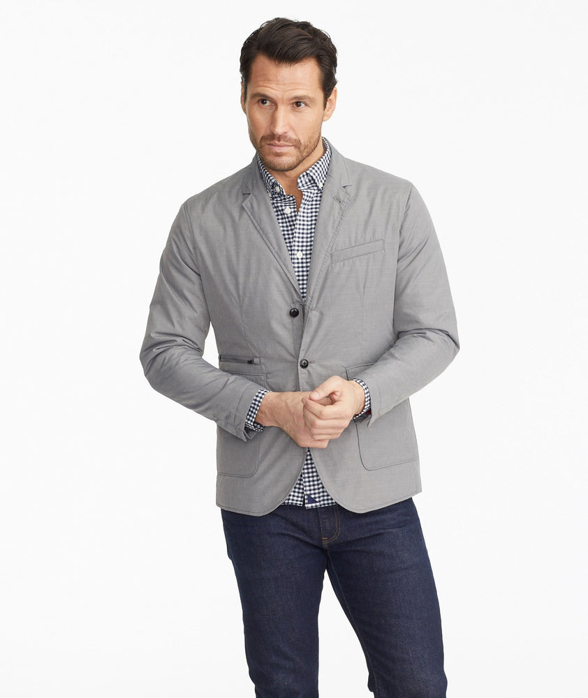 Model wearing a Light Grey The Travel Blazer