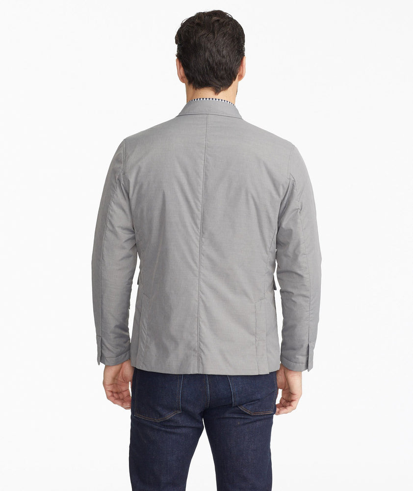 Model wearing a Light Grey The Travel Blazer