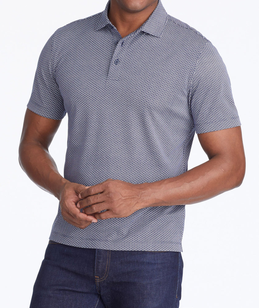 Model wearing a Navy Wrinkle-Free Damaschino Medallion Polo