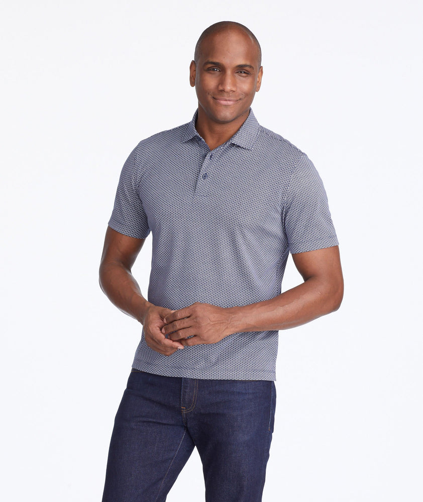 Model wearing a Navy Wrinkle-Free Damaschino Medallion Polo