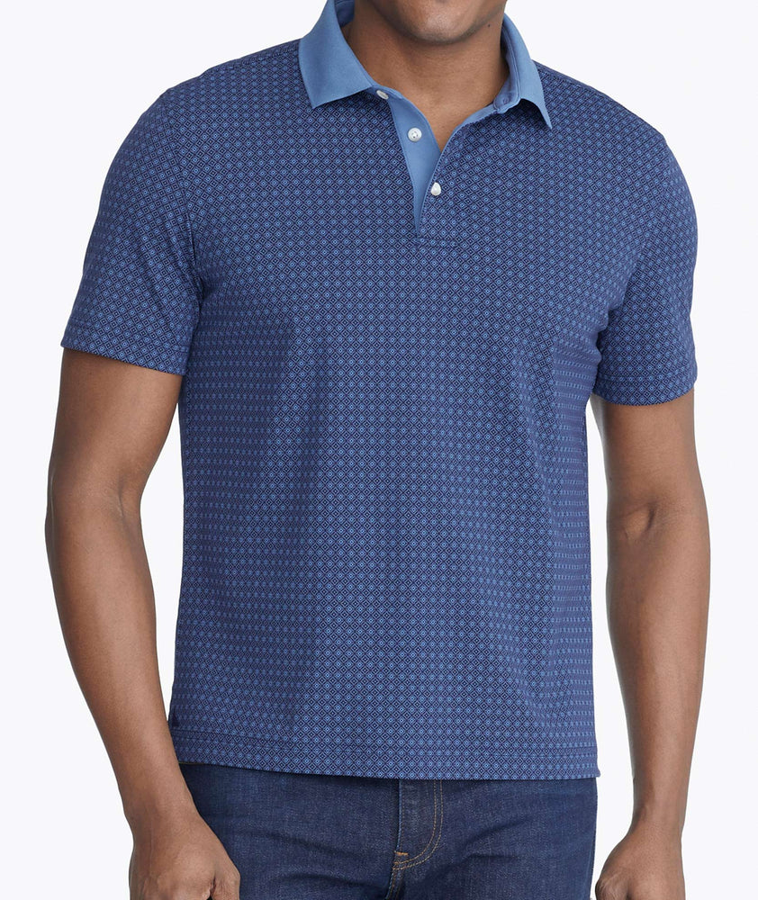 Model wearing a Blue Printed Polo with Contrast Collar