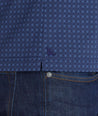 Model wearing a Blue Printed Polo with Contrast Collar