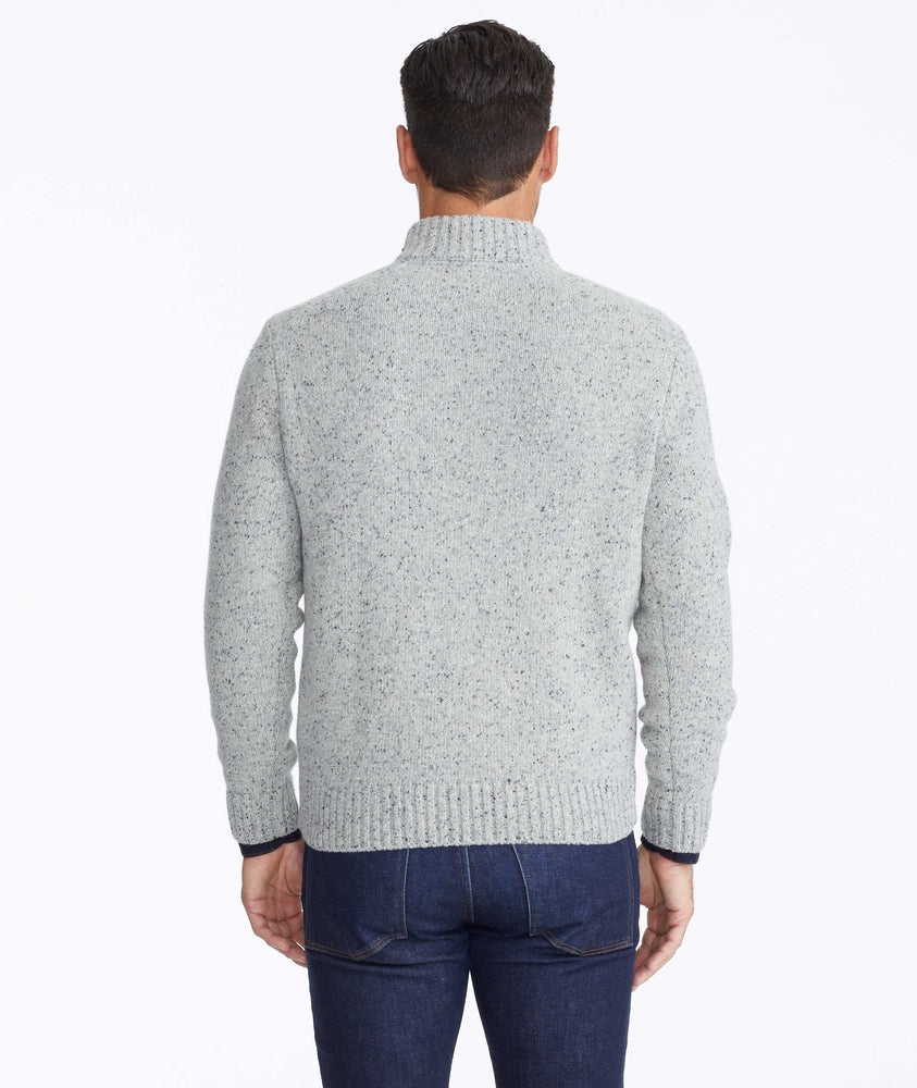 Model wearing a Grey Button-Neck Donegal Sweater
