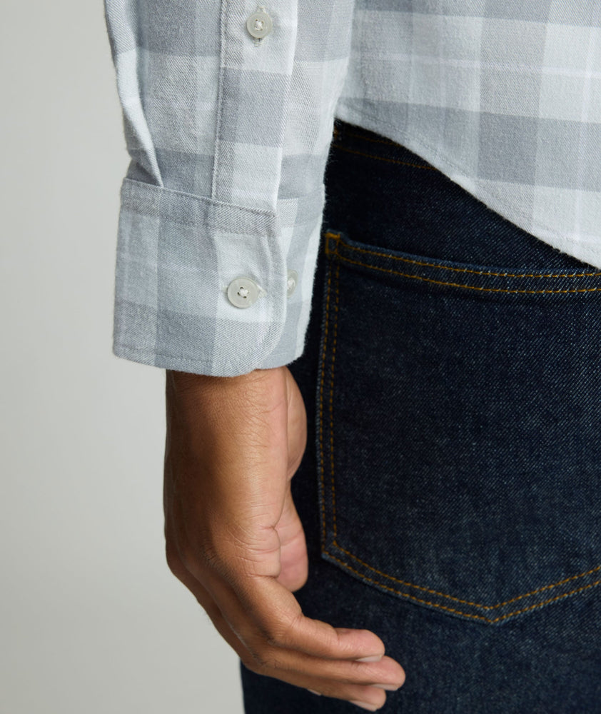 Model is wearing UNTUCKit Performance Flannel Brightlake Shirt in gray.
