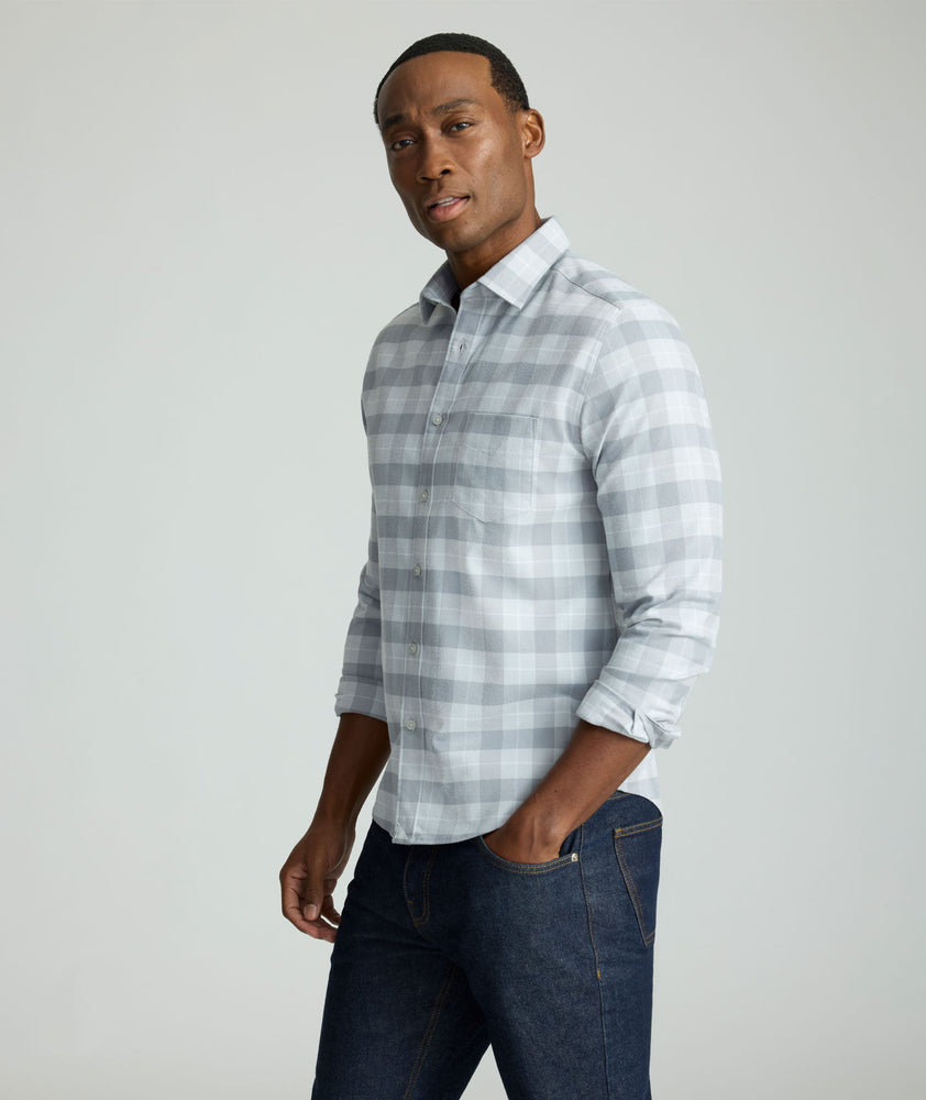 Model is wearing UNTUCKit Performance Flannel Brightlake Shirt in gray.