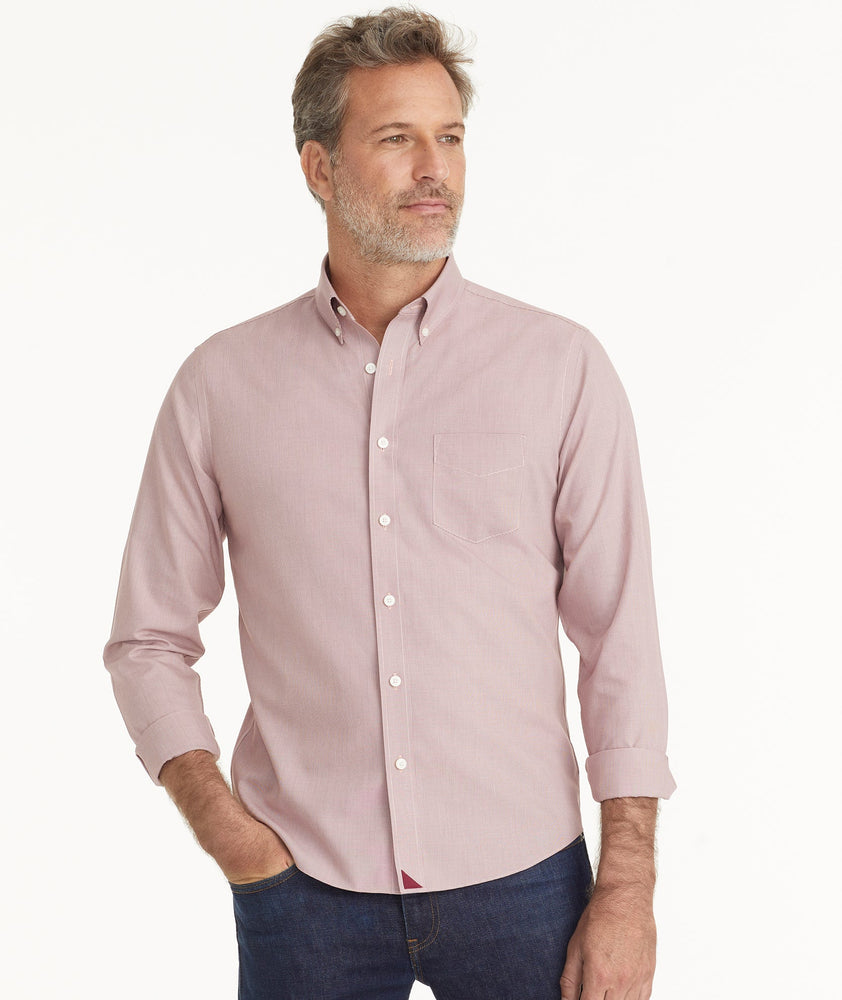 Model is wearing UNTUCKit Wrinkle-Free Cadetto Shirt in Maroon.