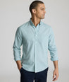 Model is wearing UNTUCKit Wrinkle-Free Cadetto Shirt in Light Green.