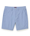 Model is wearing UNTUCKit Chancellor shorts in stonewash.