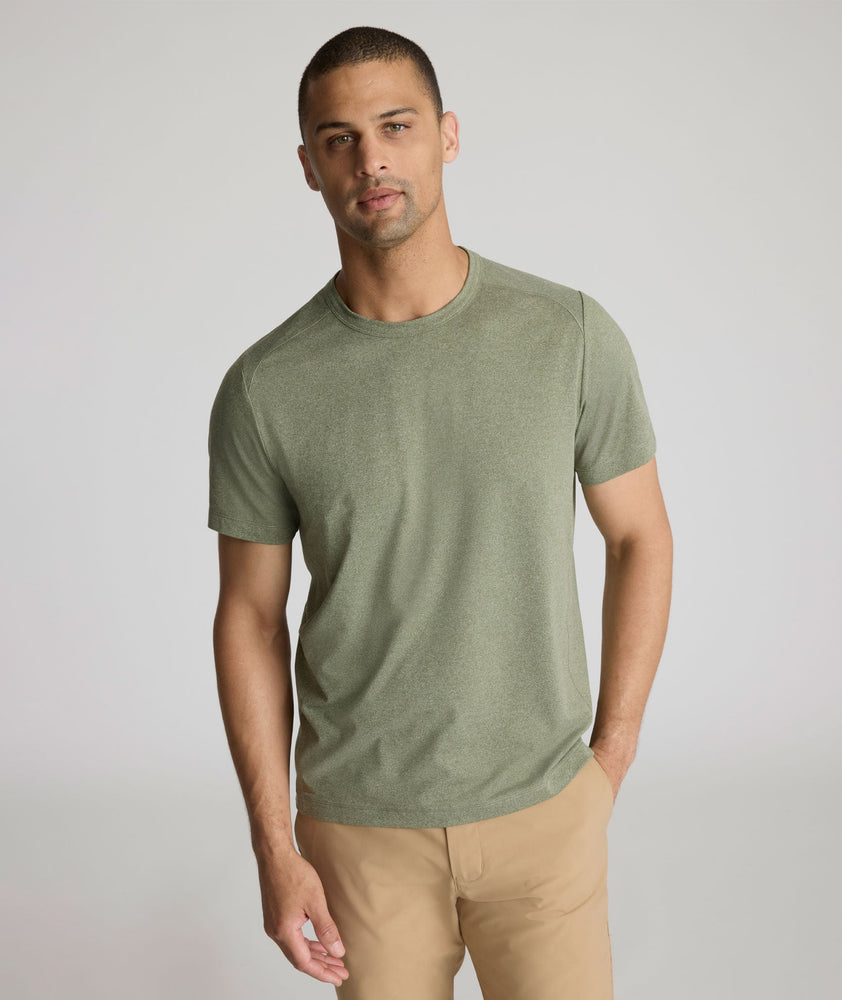 Model is wearing UNTUCKit Clarendon II in Olivine.