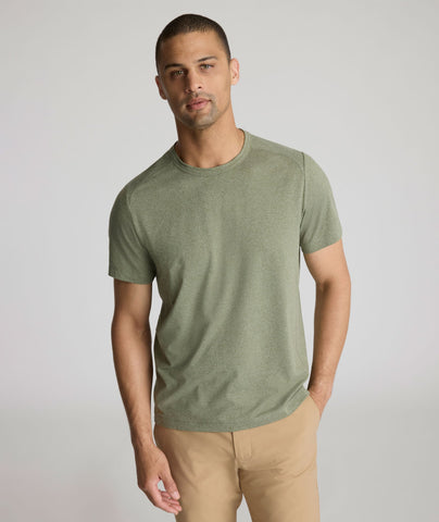 Model is wearing UNTUCKit Clarendon II in Olivine.