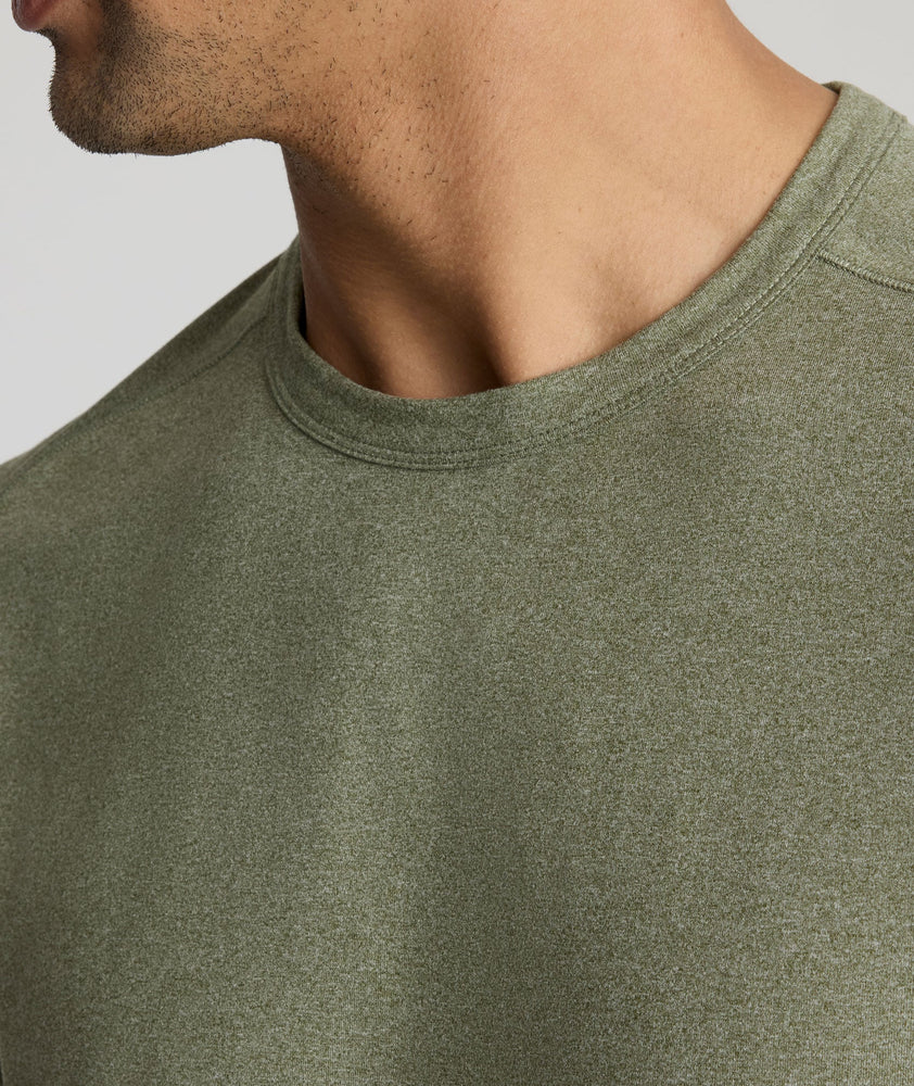 Model is wearing UNTUCKit Clarendon II in Olivine.