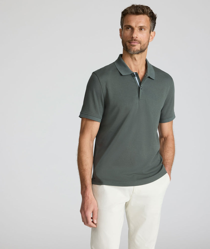 Model is wearing UNTUCKit Damaschino polo in Urban chic.