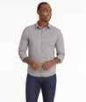 Model is wearing UNTUCKit Wrinkle-Free Performance Gironde Shirt in Light Gray.