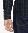 Model is wearing UNTUCKit Wrinkle-Free Grant Shirt in Green & Navy Tartan.