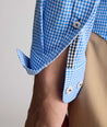 Model is wearing UNTUCKit CottonTek Harland Shirt in blue. 