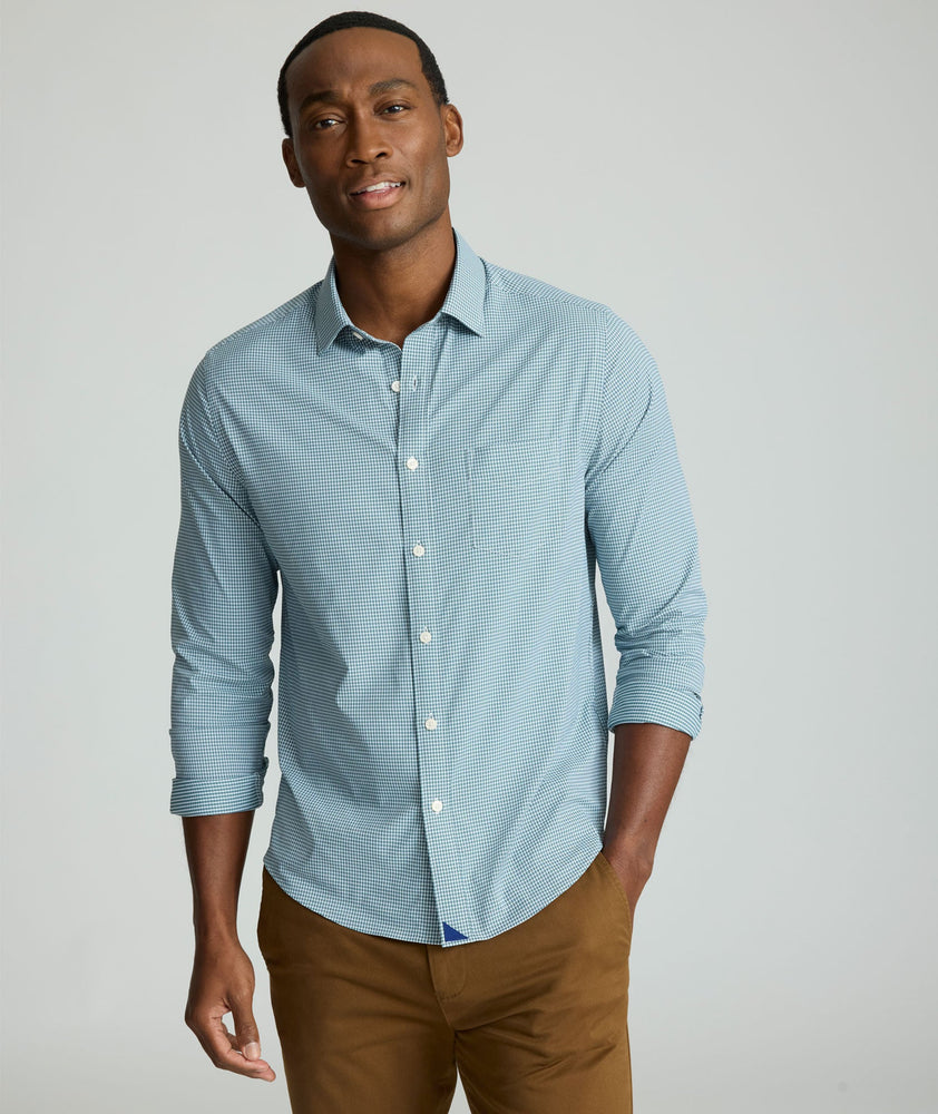 Model is wearing UNTUCKit Lafior Performance Shirt with Pocket. 