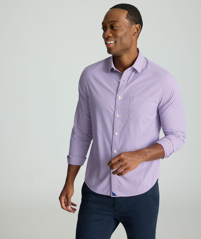 Model is wearing UNTUCKit Lafior Performance Shirt with Pocket. 
