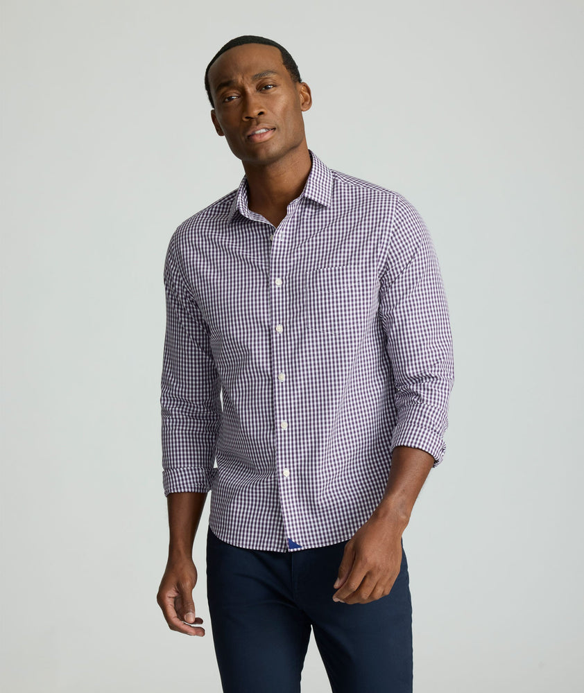 Model is wearing UNTUCKit Wrinkle-Free Lawrence Shirt in blackberry. 