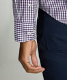Model is wearing UNTUCKit Wrinkle-Free Lawrence Shirt in blackberry. 