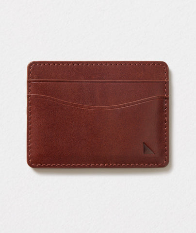 UNTUCKit leather card case in brown. 