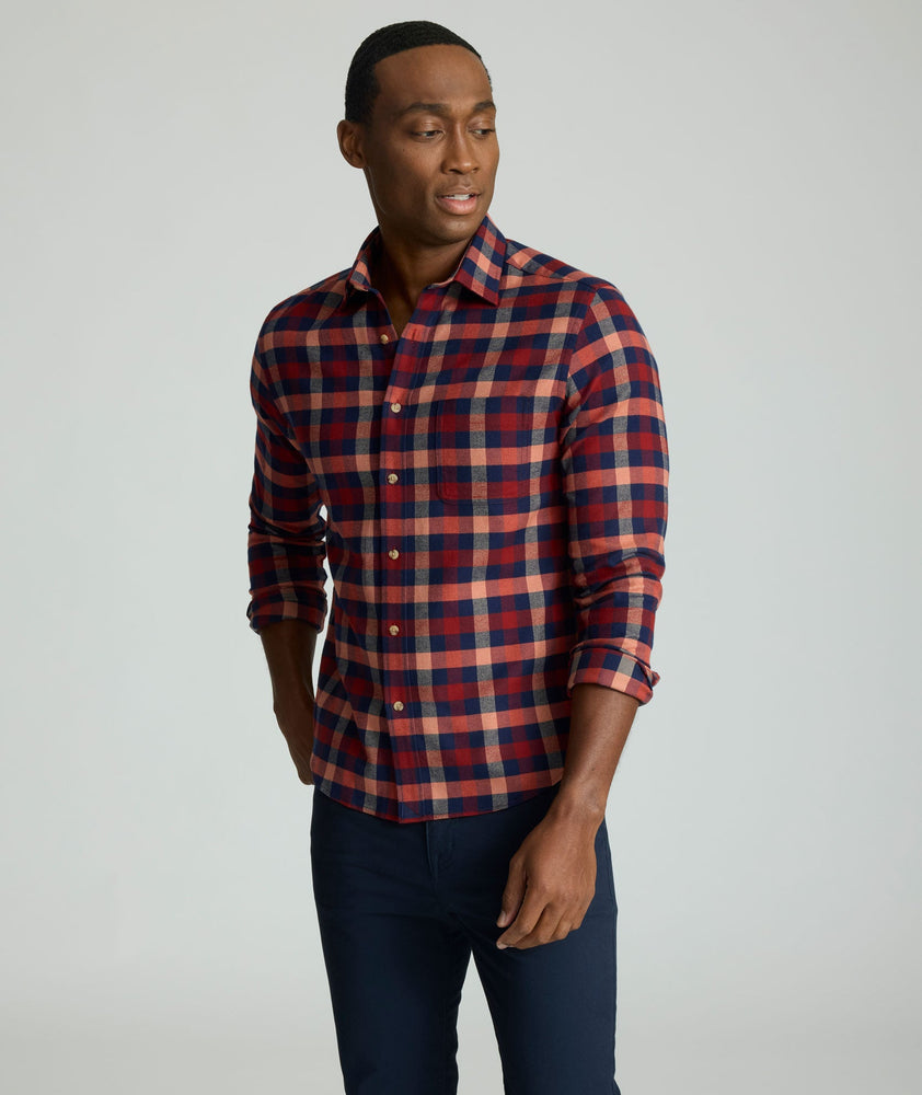 Model is wearing UNTUCKit Flannel Plenville Shirt in Syrah Check.