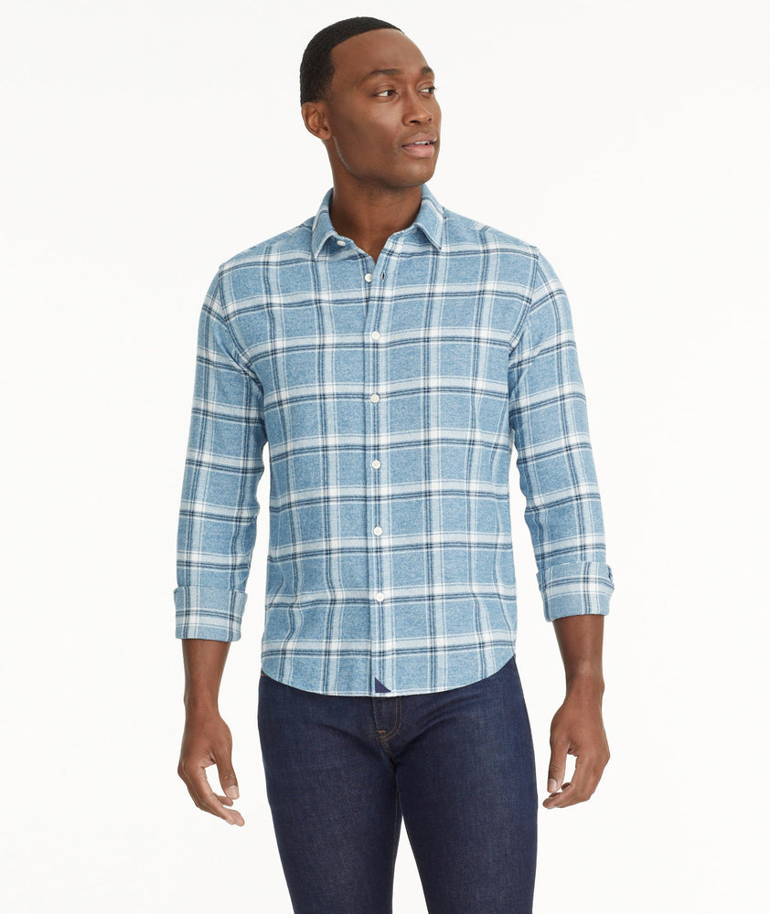 Model is wearing UNTUCKit Flannel Salentino Shirt in Light Blue Heathered Plaid.