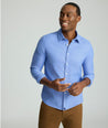 Model is wearing UNTUCKit Wrinkle-Free Veneto Shirt in light blue.