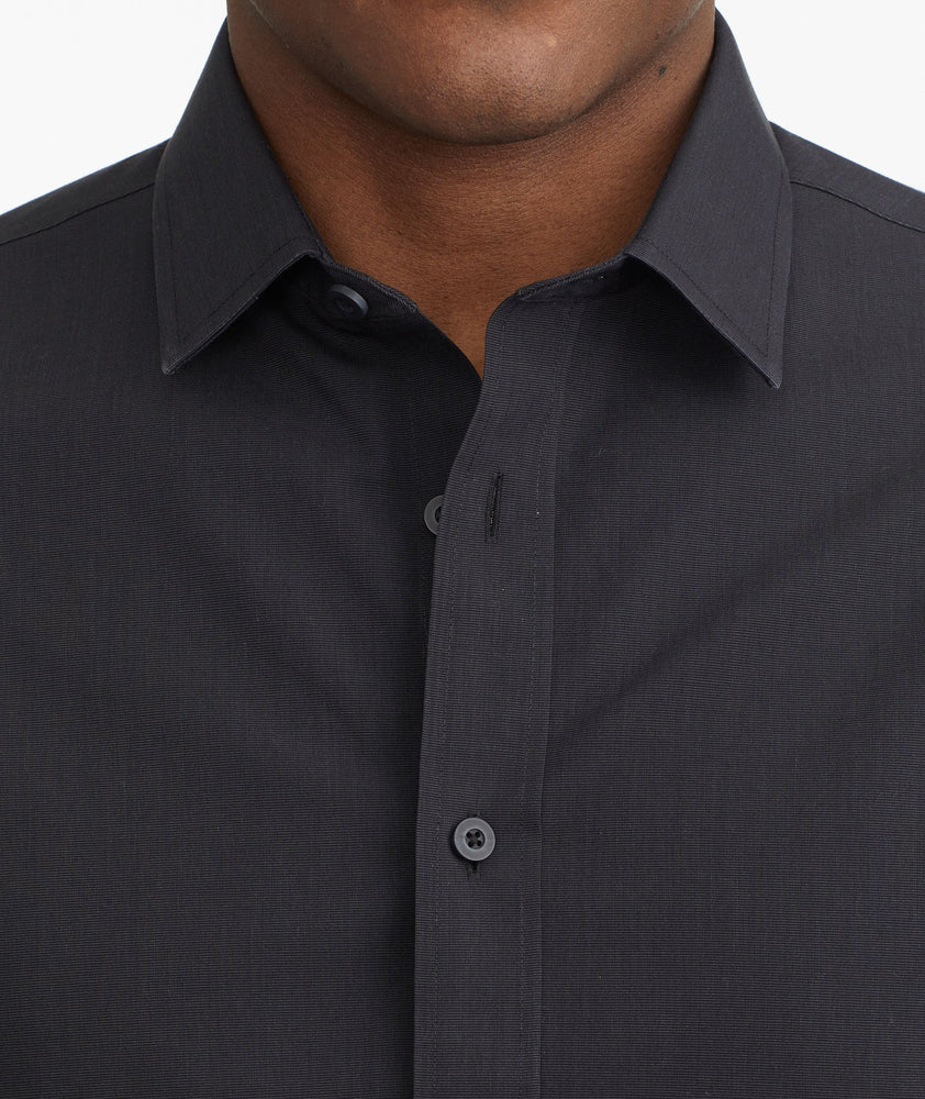 Model wearing a Black Wrinkle-Free Black Stone Shirt