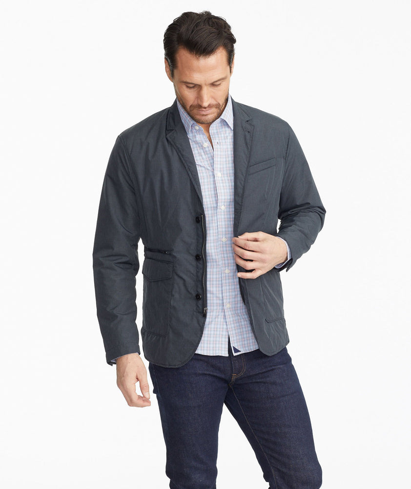 Model wearing a Grey The Travel Blazer