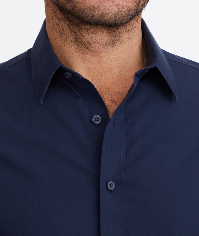 Model wearing a Navy Wrinkle-Free Castello Shirt