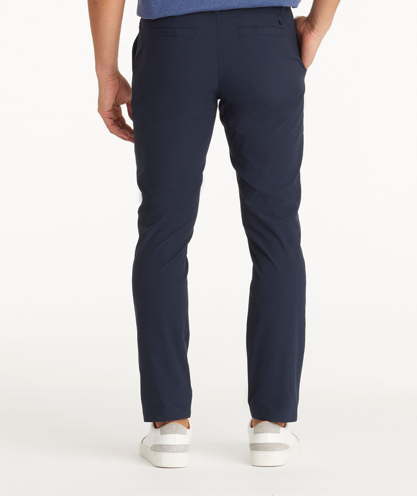 Model wearing UNTUCKit Navy Traveler Pants