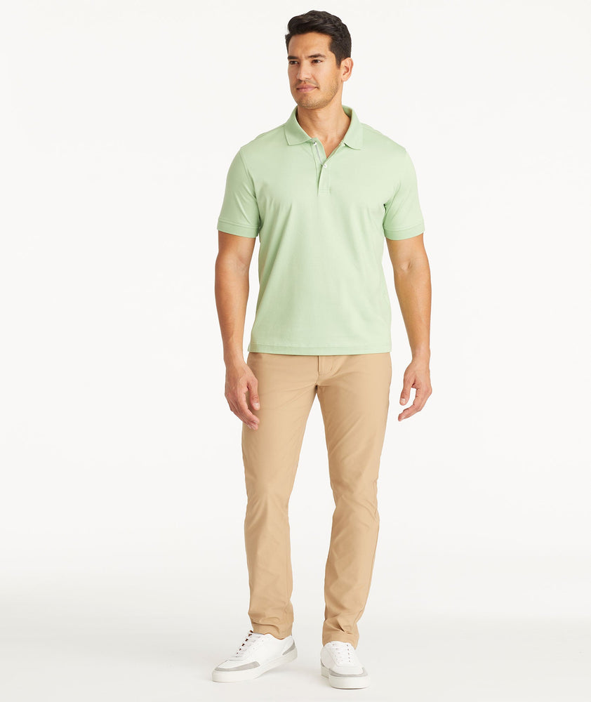 Model wearing UNTUCKit Tan Traveler Pants