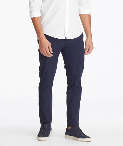 Model wearing a Navy Traveler Pants