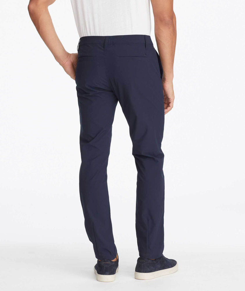 Model wearing a Navy Traveler Pants
