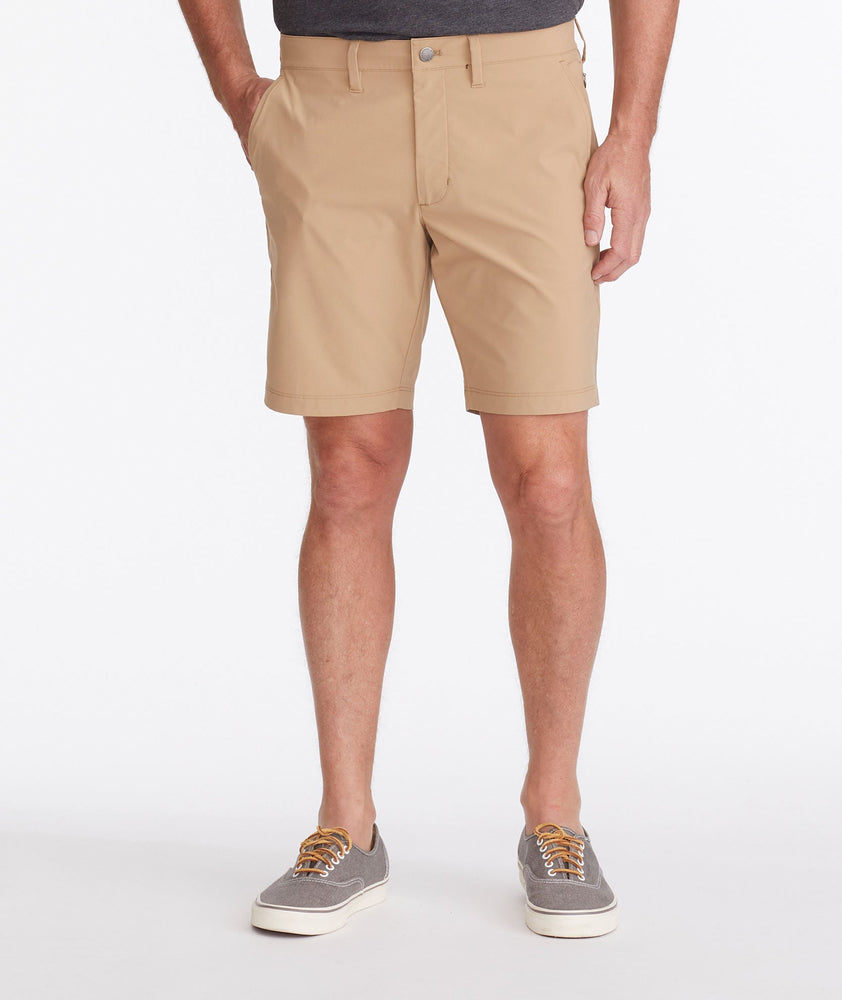 Model wearing a Tan Traveler Shorts
