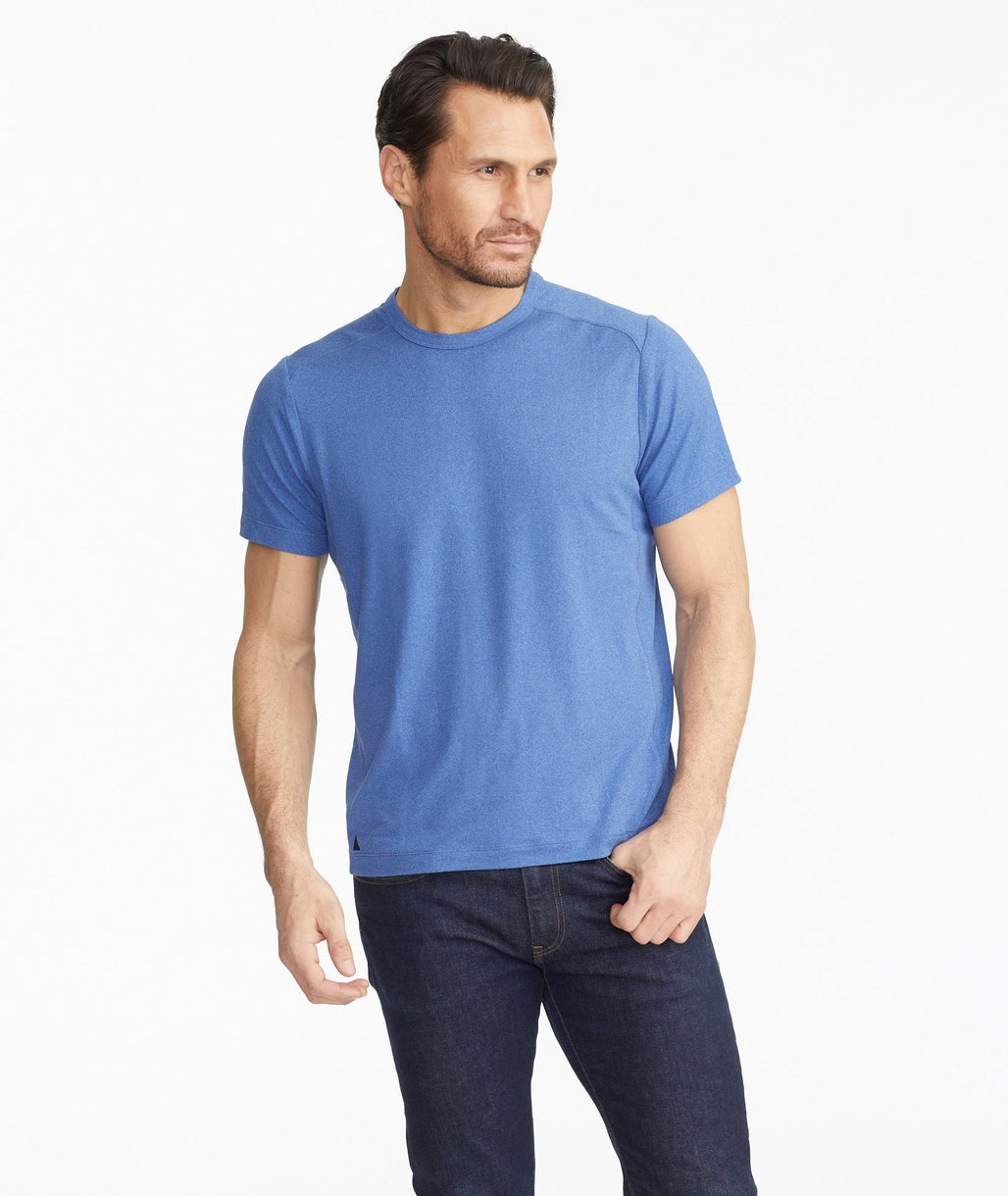 Model wearing a Bright Blue The Performance Tee