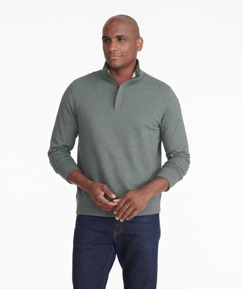 Model wearing a Mid Green Quater-Zip Sweatshirt