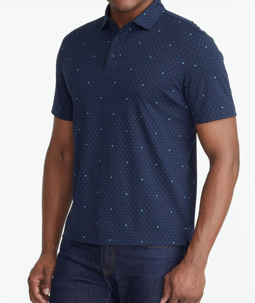 A model wearing a Navy Wrinkle-Free Damaschino Horseshoe Polo