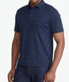 A model wearing a Navy Wrinkle-Free Damaschino Horseshoe Polo