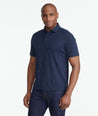 A model wearing a Navy Wrinkle-Free Damaschino Horseshoe Polo