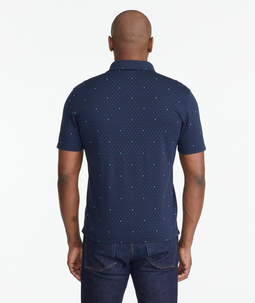A model wearing a Navy Wrinkle-Free Damaschino Horseshoe Polo