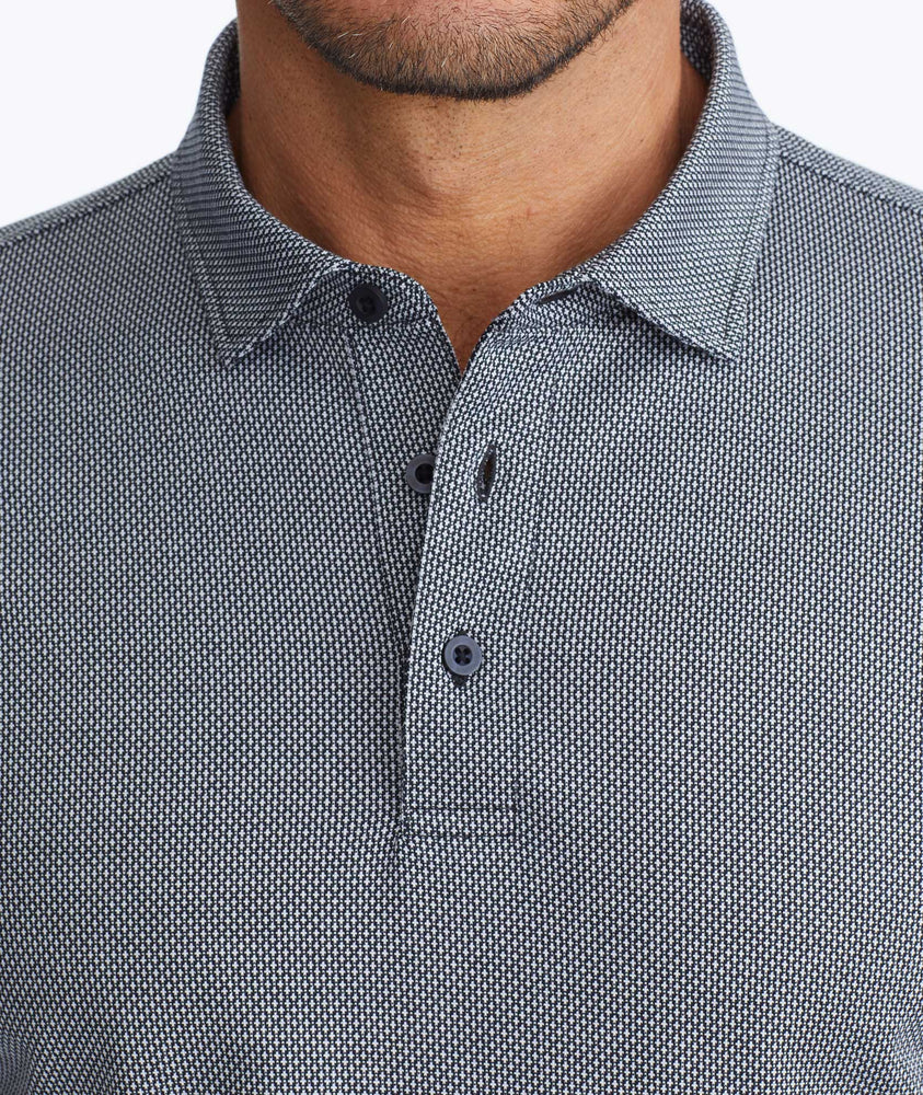 Model wearing a Wrinkle-Free Damaschino Birdseye Long-Sleeve Polo