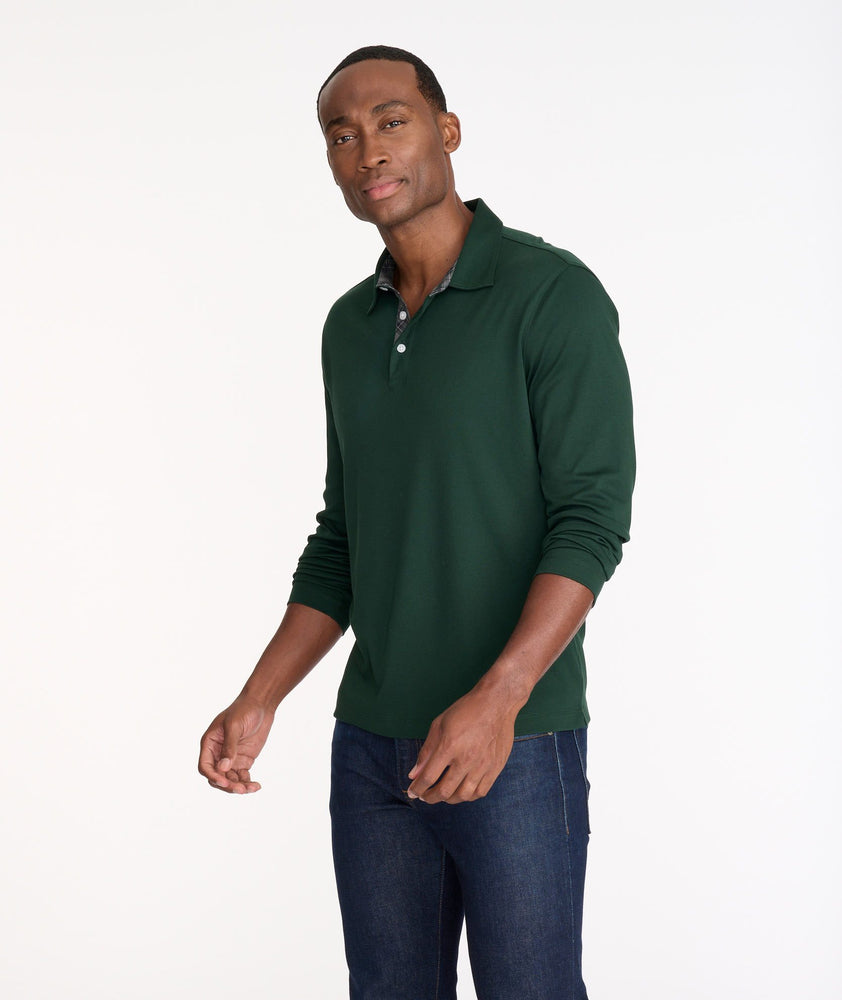 Model wearing a Dark Green Wrinkle-Free Damaschino Long-Sleeve Polo with Contrast Placket
