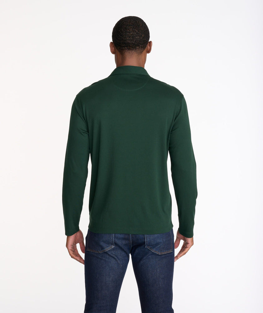 Model wearing a Dark Green Wrinkle-Free Damaschino Long-Sleeve Polo with Contrast Placket