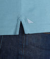 Model wearing a Light Blue Wrinkle-Free Damaschino Long-Sleeve Polo